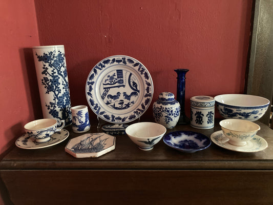 Collection of blue and white pottery on a table