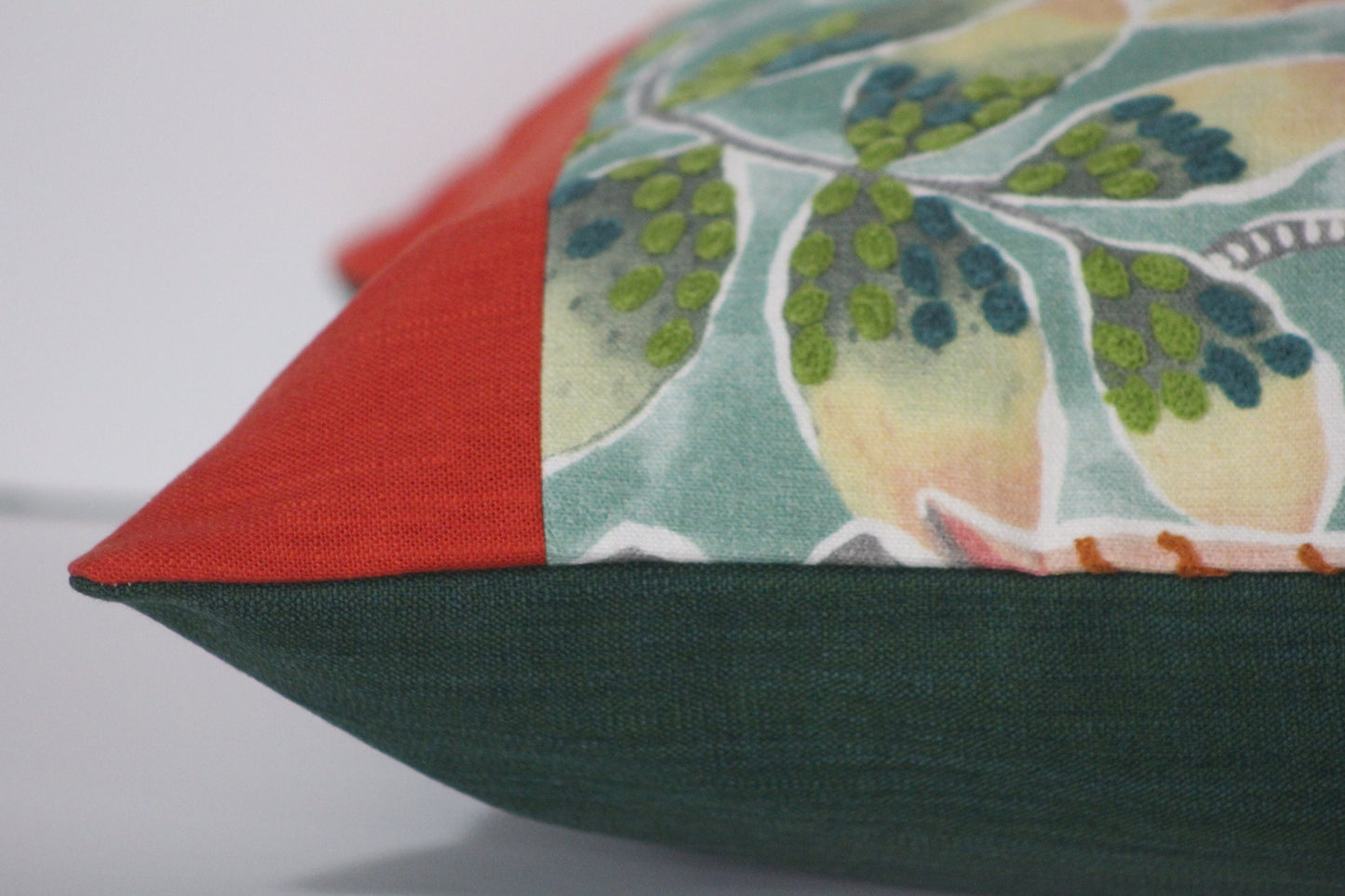 Embroidered tropical print and orange linen 20” pillow cover